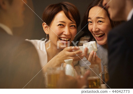 Working people drinking alcohol 44042773