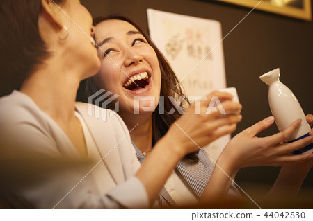 Working people drinking alcohol 44042830