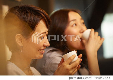 Working people drinking alcohol Working people drinking alcohol 44042833