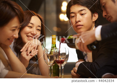 Working people drinking alcohol 44042834