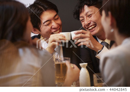 Working people drinking alcohol 44042845