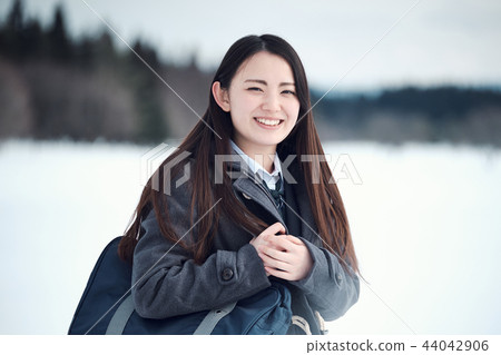 High school girl in snowy country 44042906