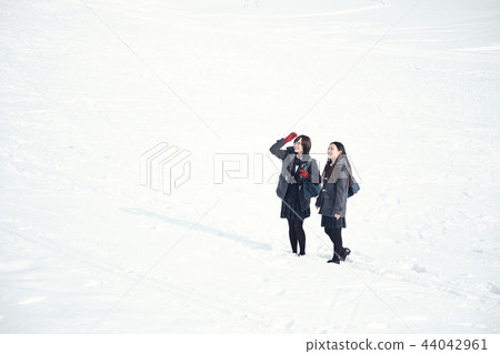 High school girl in snowy country High school girl in snowy country 44042961