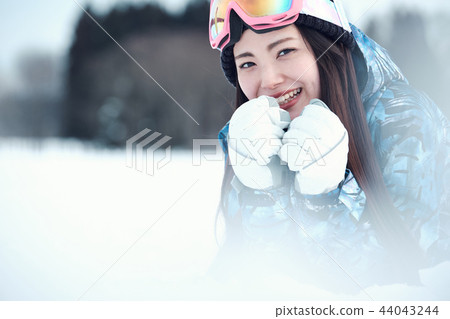 Ski resort woman 44043244