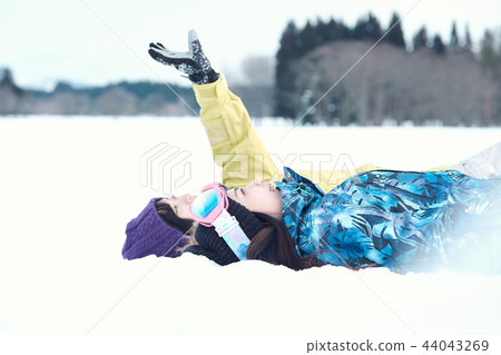 Ski resort woman Ski resort woman 44043269