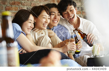 People enjoying a home party People enjoying a home party 44043409