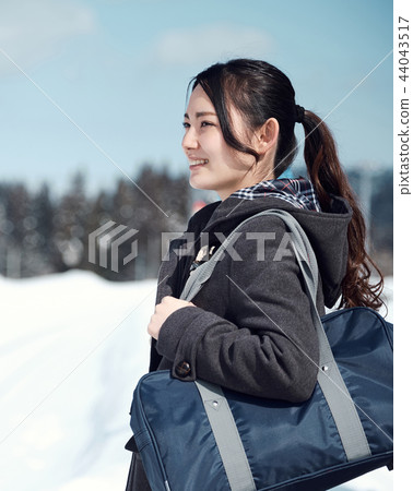 High school girl in snowy country 44043517