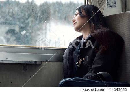 High school girl taking a train 44043650