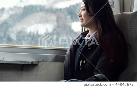 High school girl taking a train 44043672