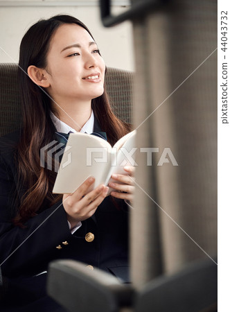 High school girl taking a train 44043732