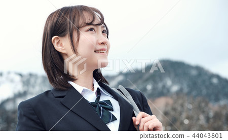High school girl in snowy country High school girl in snowy country 44043801