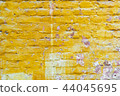 Old brick wall texture of red stone blocks closeup 44045695