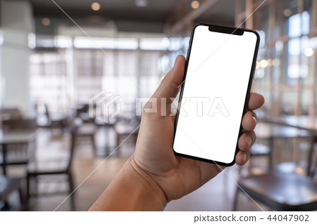 Close up man hands using smart phone  44047902