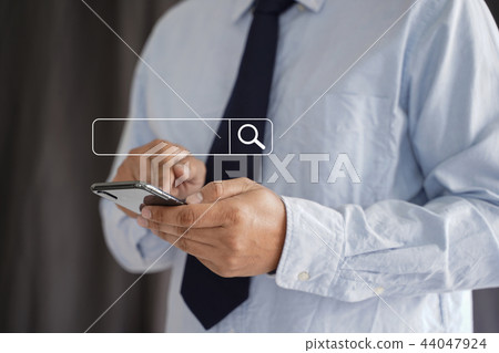 Businessman using Searching Browsing Internet Businessman using Searching Browsing Internet 44047924