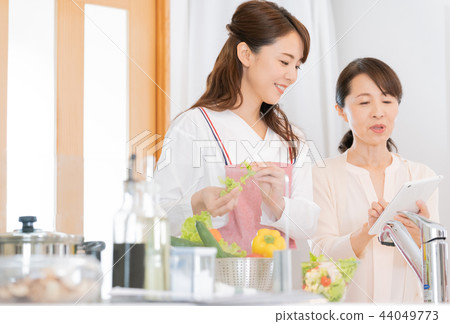 A woman making cooking 44049773
