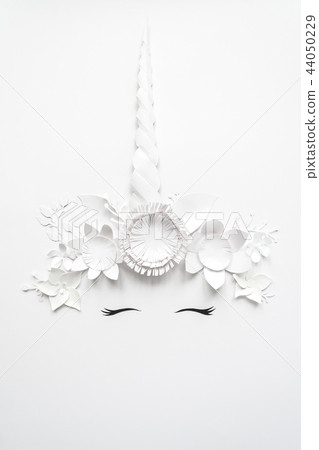 Cute unicorn made of white paper flowers Cute unicorn made of white paper flowers 44050229