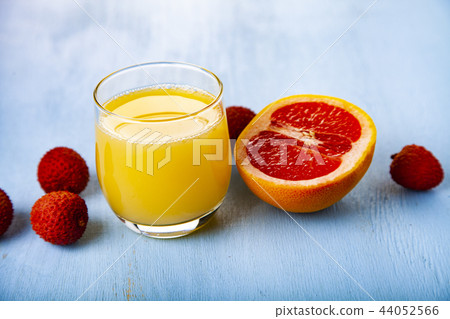 Glass of juice, grapefruit and lychee Glass of juice, grapefruit and lychee 44052566