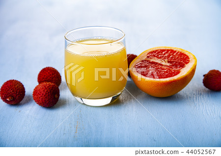 Glass of juice, grapefruit and lychee 44052567