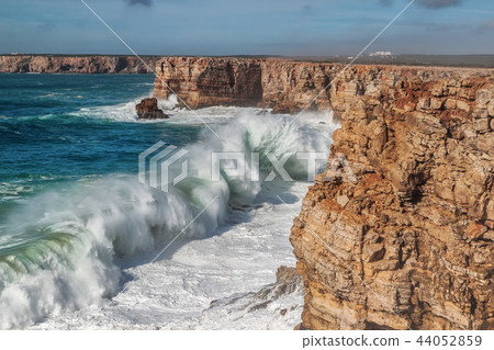 Giant waves during a storm in Sagres, Costa Vicentina. Giant waves during a storm in Sagres, Costa Vicentina. 44052859