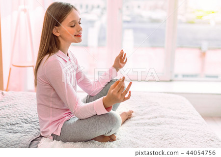 Charming little female enjoying her weekends at home 44054756