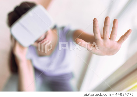Close up of charming girl that showing her palm Close up of charming girl that showing her palm 44054775