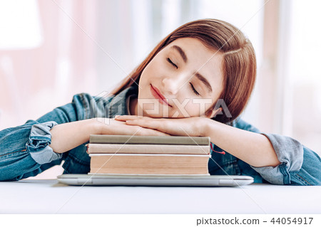 Relaxed girl imagining her future summer holidays 44054917