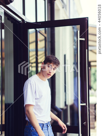 Handsome male model wearing white blank t-shirt 44056018