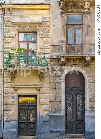 The doors and windows of two buildings The doors and windows of two buildings 44056534