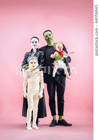 Halloween Family. Happy Father, Mother and Children Girls in Halloween Costume and Makeup 44056645