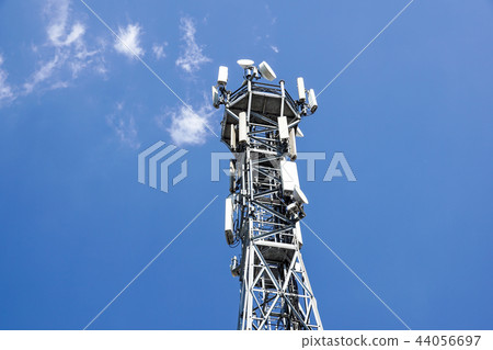 Antenna tower,antenna tower building with the blue sky. Close-up of the antenna building with the Antenna tower,antenna tower building with the blue sky. Close-up of the antenna building with the 44056697