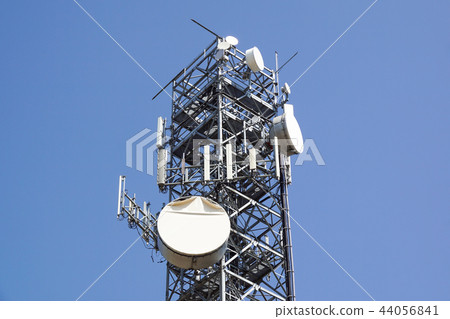 Antenna tower,antenna tower building with the blue sky. Close-up of the antenna building with the Antenna tower,antenna tower building with the blue sky. Close-up of the antenna building with the 44056841