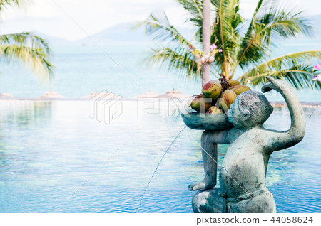Monkey carried coconuts stone sculpture 44058624