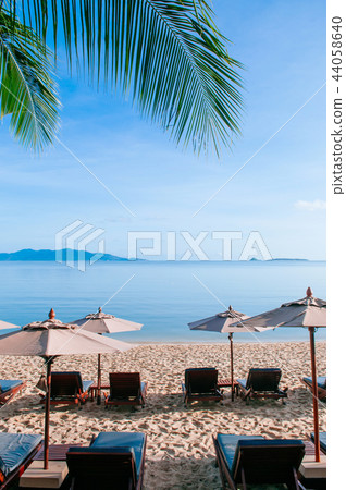Vacation beach beds under umbrella in summer Samui 44058640