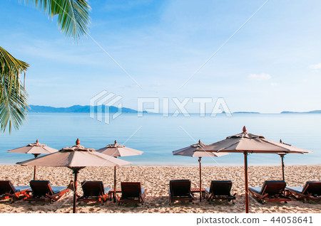 Vacation beach beds under umbrella in summer Samui 44058641