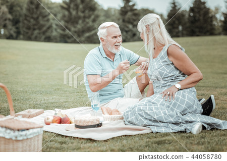 Relaxed mature man going to eat dessert Relaxed mature man going to eat dessert 44058780