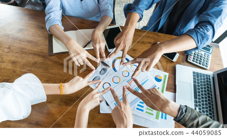 People in team harmonious hand meeting with worm l People in team harmonious hand meeting with worm l 44059085