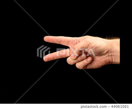 Male hand shows score or number two Male hand shows score or number two 44061081