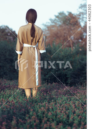 Asian woman in traditional japanese kimono outdoors 44062303