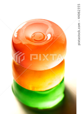 Three clorfull lollipops on a white background Three clorfull lollipops on a white background 44062355