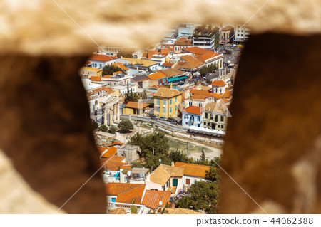 view of the city through the slit view of the city through the slit 44062388