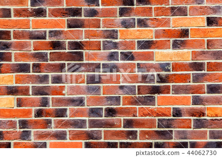 Background of old weathered red brick wall 44062730