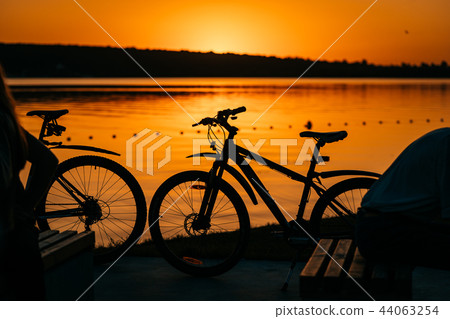 bicycle on the background of a sunset 44063254