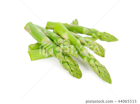pile of fresh asparagus on white background pile of fresh asparagus on white background 44065515