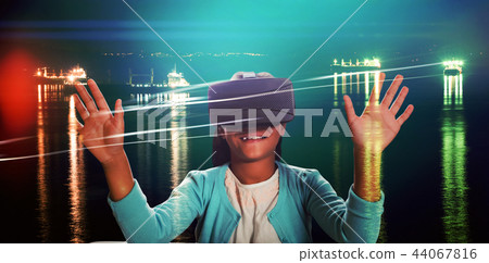 Composite image of black girl with virtual reality glasses 44067816