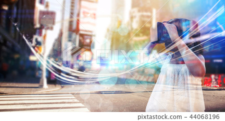 Composite image of girl wearing virtual reality simulator 44068196