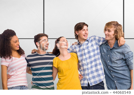 Composite image of college students standing with arms around 44068549