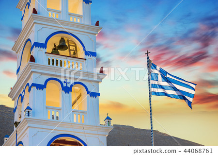 Classic view of blue dome church in Santorini. 44068761