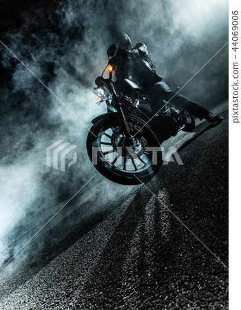 High power motorcycle chopper at night. 44069006