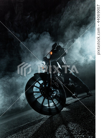 High power motorcycle chopper at night. 44069007