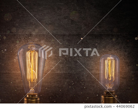 Vintage Edison light bulbs on dark background. Vintage Edison light bulbs on dark background. 44069062